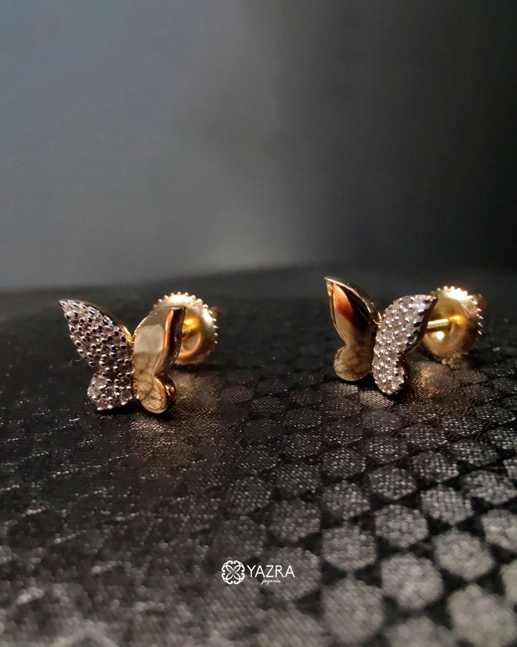 Arete mariposa de oro y diamantes